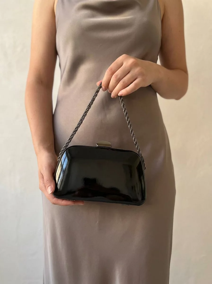 Black patent leather handbag